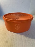 Tupperware orange canister