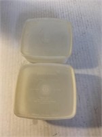 Two Tupperware bowls with lids