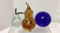 (3) Art glass paper weights- one is an amber