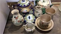 11  oriental pieces of china, 2 teapots, teacup,