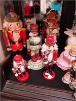Seven nutcrackers, one is Fitz & Floyd, from