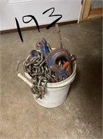 bucket of chains and misc tools