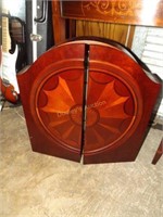 contemporary dartboard in inlayed mahogany finishe