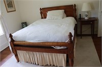 Double bed frame with acorn posters, mattress and