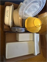 Tupperware containers, egg dish, cutting board,