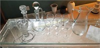 Glass decanters, wine glasses, pitcher