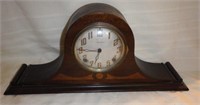 Ingraham inlaid camelback mantel clock