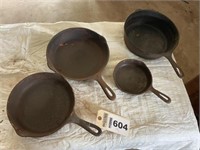 (4) Wagner cast iron skillets