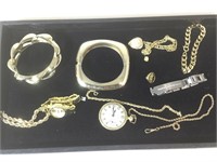 Tray lot of assorted costume jewelry and watches.