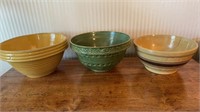 Three Antique pottery mixing bowls, ribbed,