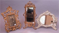 Two ornate mirrors including silverplate