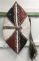 African-style war shield with horse hair whip