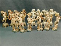 Figurines 6" T, 2" W. Figurines on raised bases