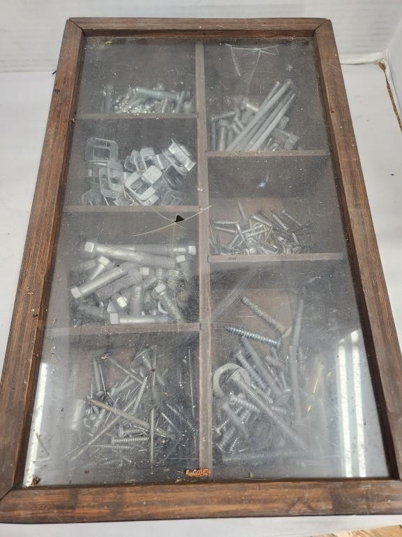 Bolts and more in wood box