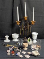 Group of candelabra, polished stones, seashells,