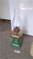 vintage oil lamp with green base