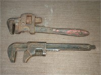 2 vintage pipe wrenches. 1 is a Ford