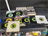 10 Beatles records and 2 books