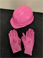 Pink hard hat and two pairs of rubber gloves