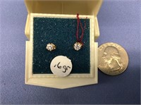 Pair of diamond earrings, VS2, .30 carat        (a