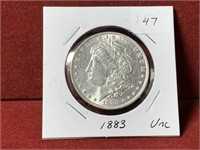 1883 UNITED STATES SILVER MORGAN DOLLAR UNC.