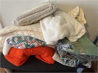 8 knitted blankets, some homemade