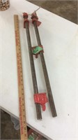 Pair of 26 inch pole clamps