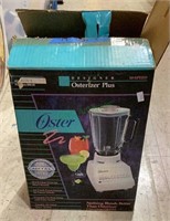 Oster Plus blender in original box. Looks unused,