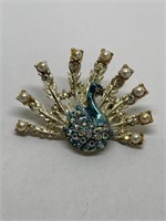 Beautiful vintage peacock pin