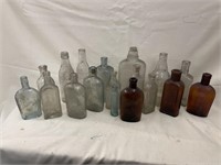 18 Vintage Bottles Most are Embossed