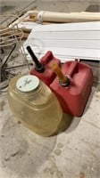Two gas cans and container