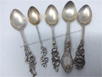 Five small decorative spoons marked Sterling 32.7