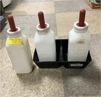 3 calf bottles with holder