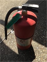 Charged fire extinguisher