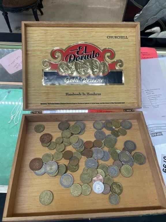 Cigar box with foreign money in it