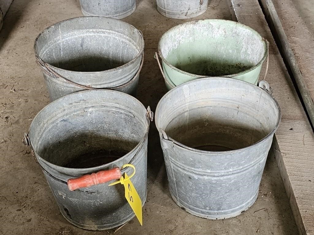 One enamel and three galvanized buckets
