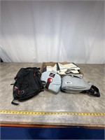 Assortment of small carrying bags and laundry