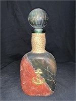 10.5 “ LEATHER COVERED BOTTLE W/ BRASS ANCHOR
