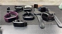 Lot Of Fitbit/ 1 Garmin Watches As Found Not Teste