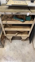 Metal rolling cart with contents includes Makita