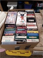 Box of miscellaneous VHS tapes