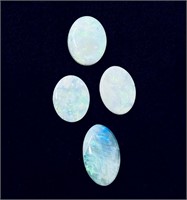 Four Cabochon Cut Natural Opals