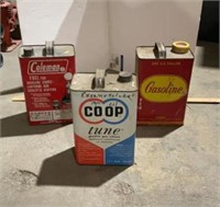 3 gas/oil cans, 2 half full