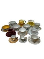 Assembled collection of tea cups and saucers