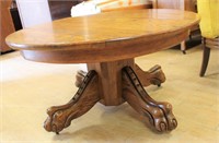 Oak round clawfoot coffee table