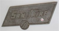 Metal Sanitaire plaque. Measures: 8" H x 16" W.