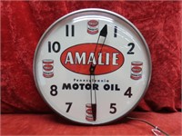 Amailie Motor oil lighted Pam clock. 14.5" dia
