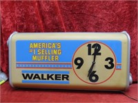 Walker Muffler Clock sign. 30"x15"