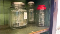 Three large glass jars