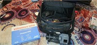 Vhs camcorder, tapes, bag, and accessories